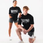 klær T442218 svart varsity t-skjorte unisex Alphalete